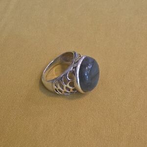 Vintage ring features a large, round labradorite gemstone set in 925 silver